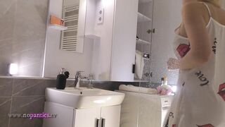 Big Ass Blonde Gal Takes off Her Panties Braless in the Bath Flashes Her Tight Shaved Twat