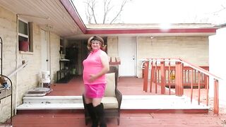 Brittney CD modeling her fresh pink outfit and boots
