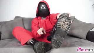 Tattooed Honey with Big Tits Puts on a Mask and Gets Into Character for a Daring Tease