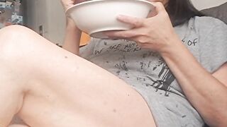 MILF eating with legs open