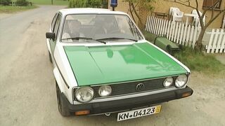 A police officer has a friend and helper as a baton in his pants.