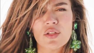 Karol G showing likewise much