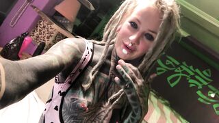 Concupiscent Rock Tattooed Cutie Shows Her Sex Toys With Booty Plug In