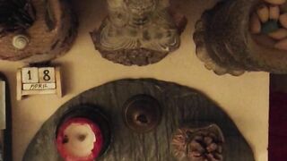 DEEP SURRENDER UNFOLDS WITH SOFT HAND THROUGH BREATH'S SLOW HUM