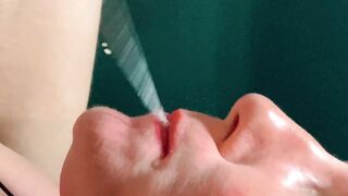 FORESKIN: She gags from huge amounts of semen , going down her throat CLOSEUP