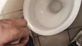 Pissing in public shitter with big weenie