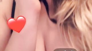 Golden-haired in mask showing tits and cunt