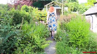 Busty playgirl Red XXX fingers herself in the garden