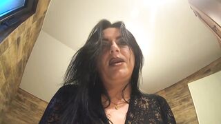 Big bazookas glisten under drenched lace robe