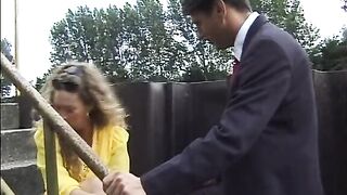 German cougar in yellow costume fucks a stranger in nature