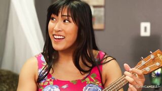 engaging in a sensuous physical encounter with her Asian lesbian companion