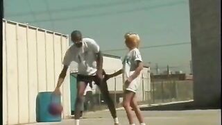 Golden-haired slut sucks and screws giant black cock on a rooftop