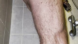 I'm taking a shower with a chastity belt on my dong!
