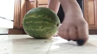Crushing a watermelon