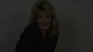 Golden-haired mature with big titties and tattooed body fingering her pussy