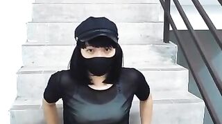 Crossdresser masturbating publicly on stairs