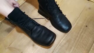 Angel spits on boots
