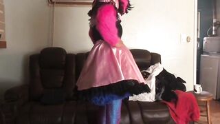 Sissy maid folds garments