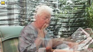 Granny smokin' and fingering her old vagina