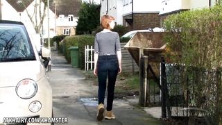 Curly golden-haired honey rubs her muff