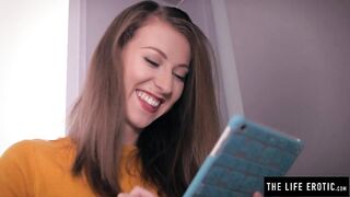 Busty, golden-haired milf in erotic lingerie and high heels is masturbating in front of the camera