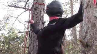 Tied to a tree on a sexy outfit, masked and outdoor deepthroat with no mercy