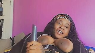 Lascivious ebony whore wears buttplug and stuffs her pissy till she makes herself cream