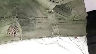 Cloth diaper soiled with pants on
