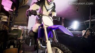 Hyena fursuiter bangs inflatable toy on his dirtbike