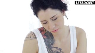 Tattooed Massage Gal Slides Down on His Cock Mid Rubdown