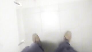 Security guard in uniform enjoying himself in the workplace bath.