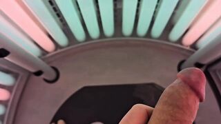 Jerking Big Schlong in Tanning Booth