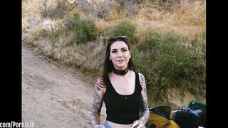 Submissive masochist Rocky Emerson bound atop a mountain and caned in the open air