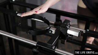 Sexually excited blonde masturbates hard in a bondage cage