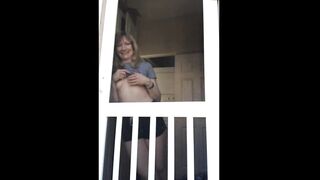 looking at my neighbor out the back door