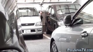 Odd asian urinate street