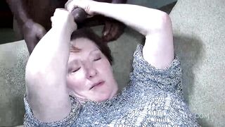 Red haired mature is about to have an orgy with friends and make some porn vids