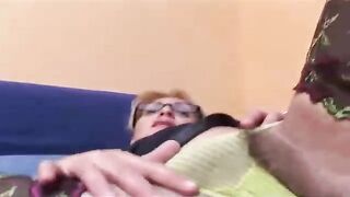 Mature golden-haired woman with a hairy pusssy is about to masturbate, in front of the camera