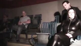 Busty brunette in a latex suit, Sofia Cucci is about to please three lewd boyz