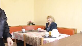 Mature blonde granny is getting hard screwing on the table and this playgirl enjoys it a lot