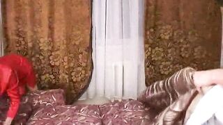 Aged Russian woman in red, satin suit loves to have sex with a much younger stud