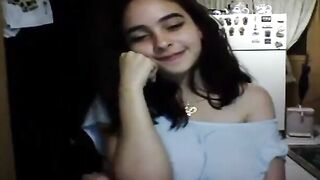 Ravishing teen brunette is showing her big boobs in front of the cam, late at night