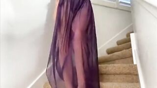 Dani Daniels is wearing sexy clothing during the time that masturbating on the staircase with her beloved sextoy