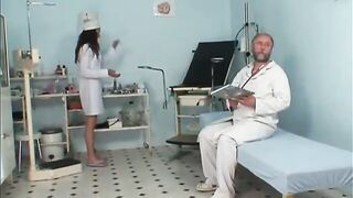 Pregnant redhead with big titties is having sex with her gynecologist while nurse is masturbating