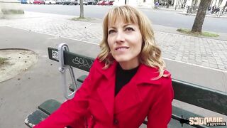 Mature golden-haired woman in a red coat is about to have sex with a stranger