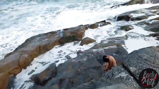 Amateur brunette is moaning during the time that getting her vagina licked by a stranger, on the beach