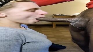 Slutty, white golden-haired is sucking a big, black dong quite deep and waiting a obscene facial