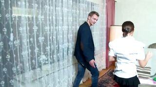 Pretty German brunette is about to get fucked on the floor, during a three-some with two lads