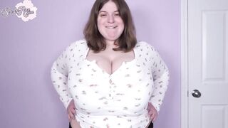 Overweight brunette with big breasts, Sarah Rae is posing and teasing in front of the camera