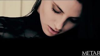 Astonishing brunette is wearing nothing but shoes with high heels while masturbating on the floor